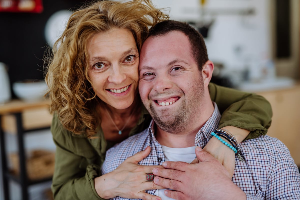 Mother with son who has Down syndrome